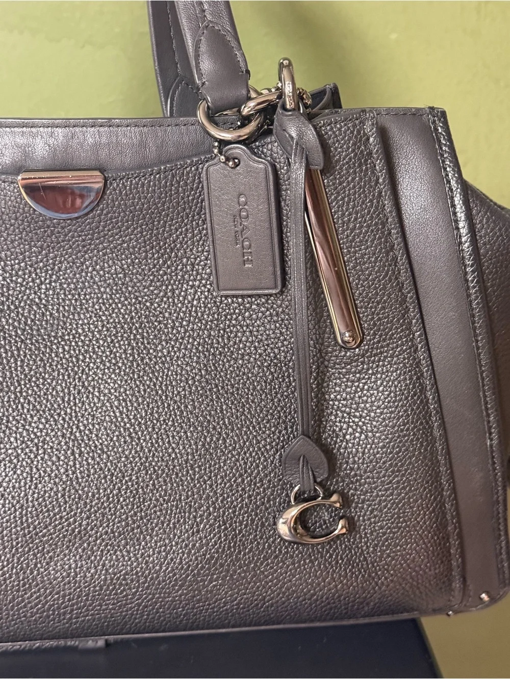 Coach polished pebble